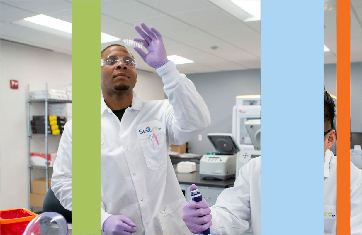 Two men working in lab